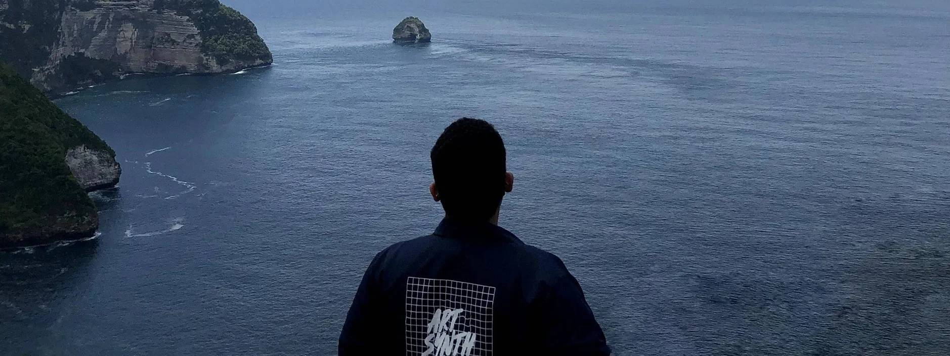 Danis looking out over the ocean in Indonesia